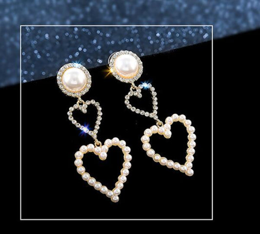 Boucles d'oreilles pendantes en perles et strass