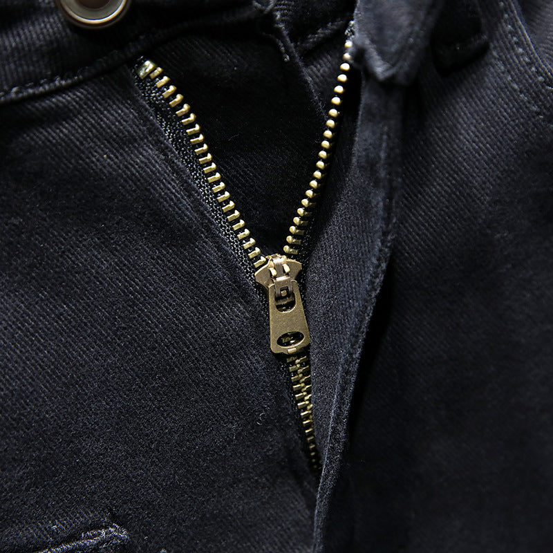 Reine schwarze, zerrissene Stretch-Jeans für Frühling und Sommer