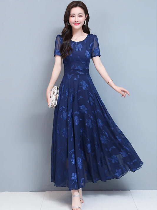 Robe longue bleue à fleurs en mousseline