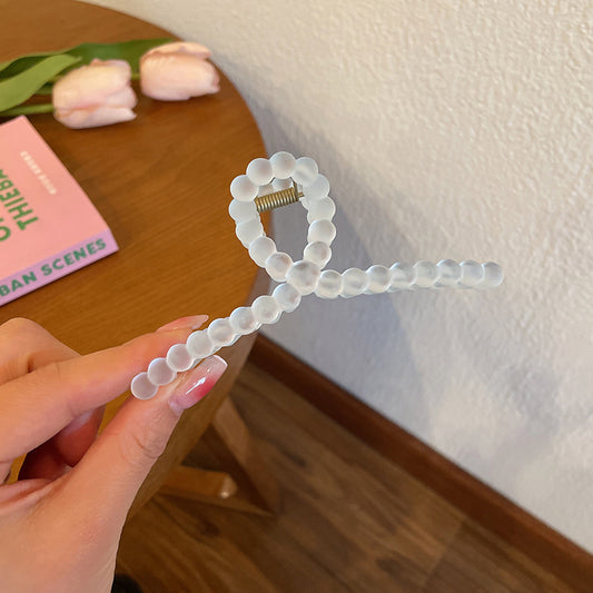 Clips de maintien de tête arrière transparents