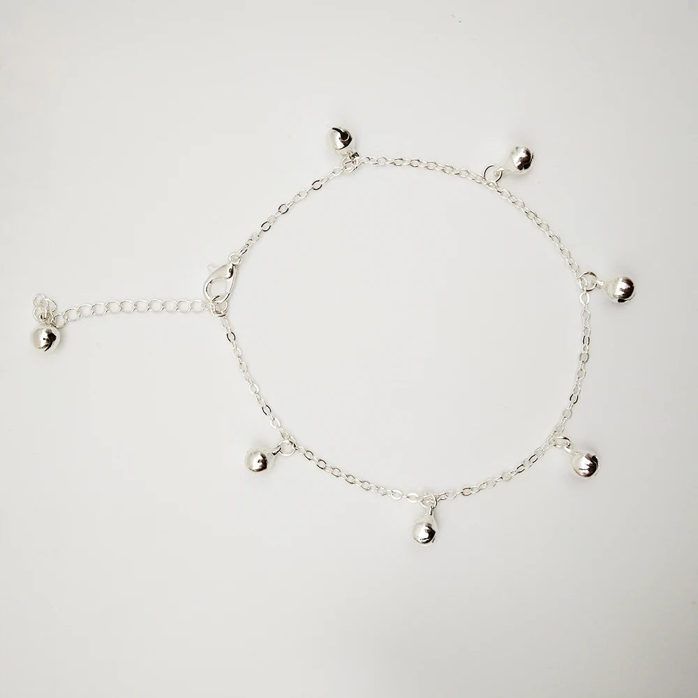 Bracelet de cheville en chaîne en métal plaqué avec pendentif cloche circulaire