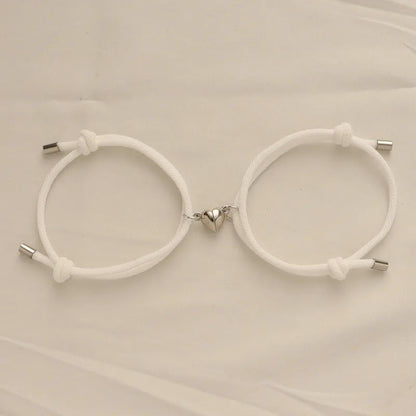 Bracelet magnétique en forme de cœur, en corde tressée, pour amoureux (2 pièces). 