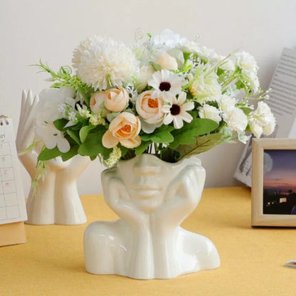 Pot de fleurs en silicone visage abstrait