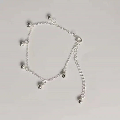 Bracelet de cheville en chaîne en métal plaqué avec pendentif cloche circulaire