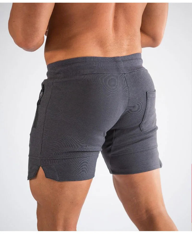 Short de sport avec poche zippée pour hommes pour la gym et la course à pied