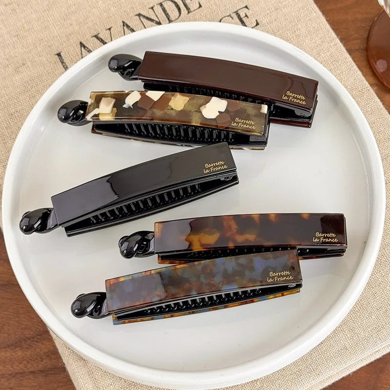 Pinces à cheveux torsadées - Pince verticale minimaliste pour queue de cheval