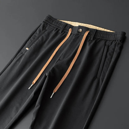 Pantalon d'attente élastique anti-rides doux pour hommes