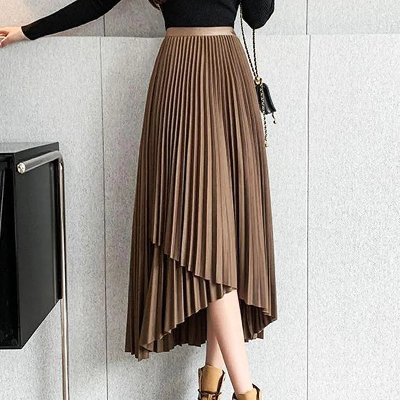 Jupe midi plissée asymétrique taille haute