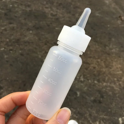 cat feeding bottle