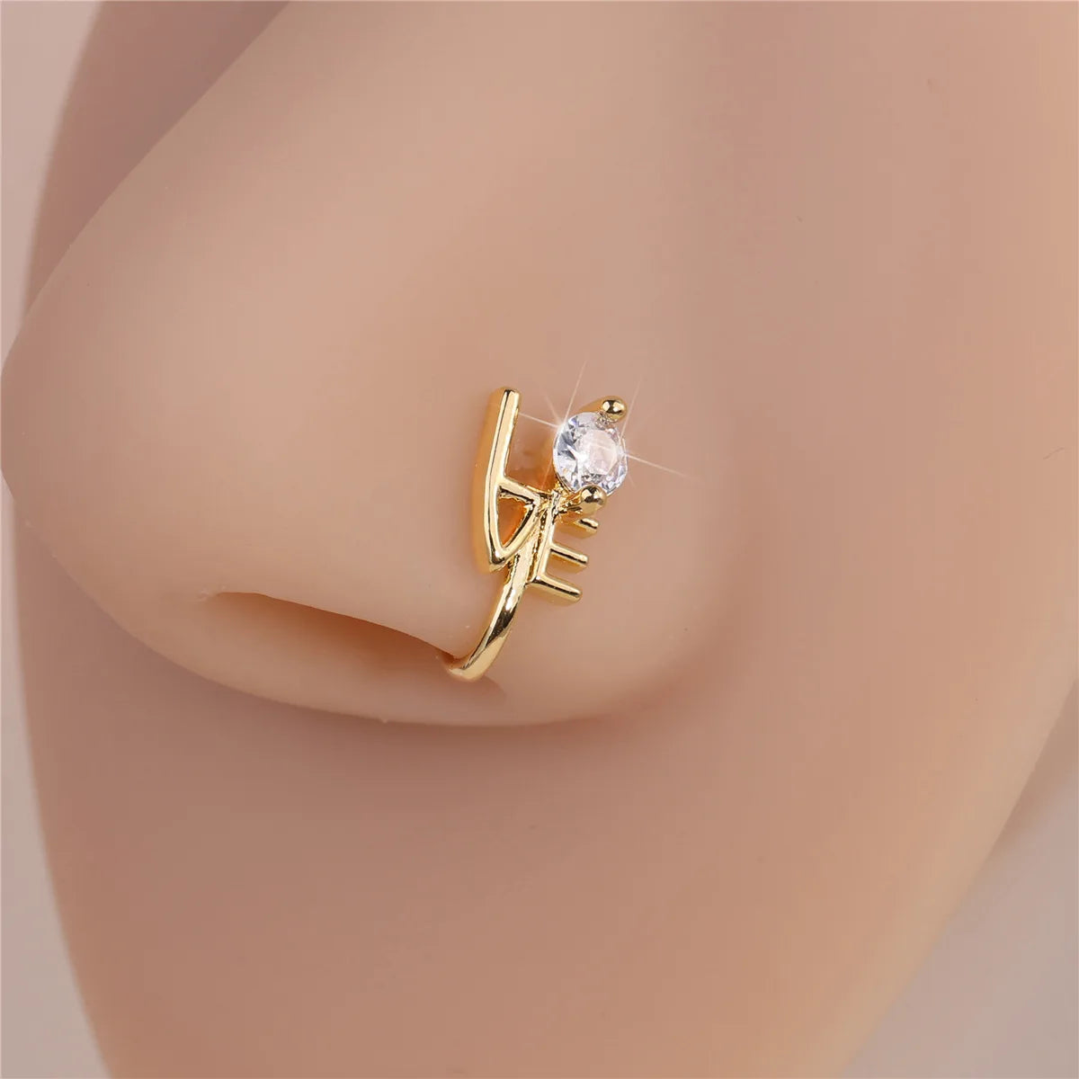 1 pince-nez en forme de U avec double breloque fleur et zircon 