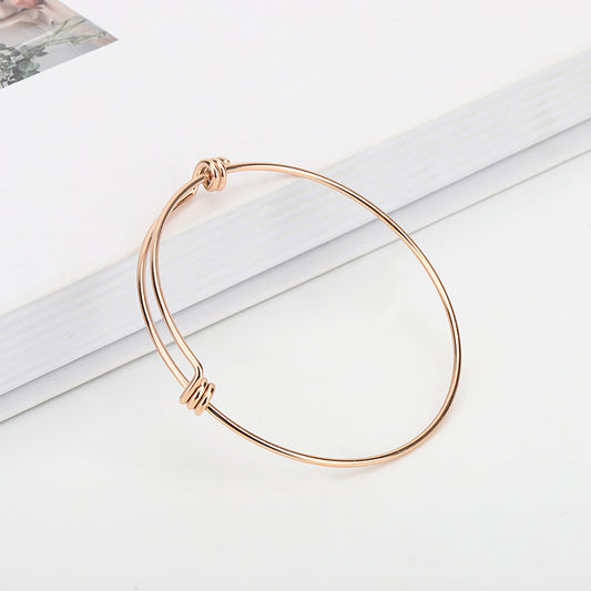 Bracelet à bobine push-pull en acier inoxydable